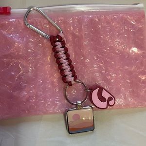 Glossier store exclusive desert keychain
